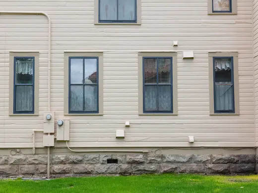 House wall after: fresh, clean siding