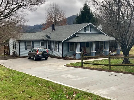 Single-story home with a long driveway