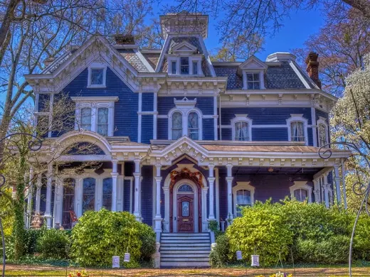 Victorian home with blue siding