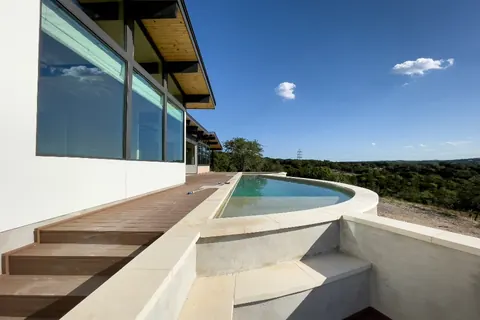 Roof terrace with a curved plunge pool